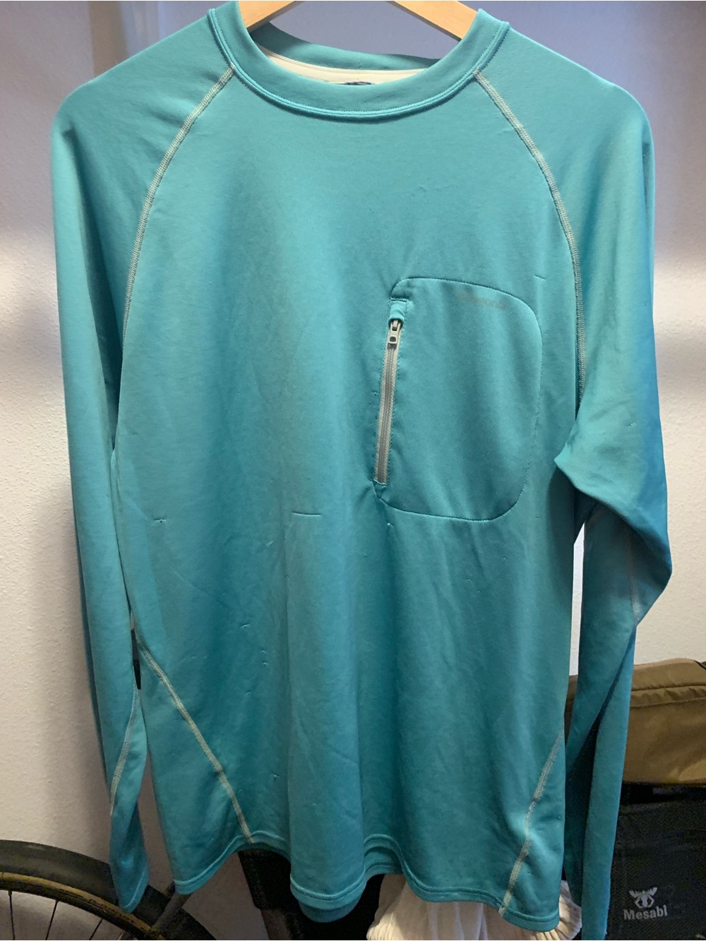 Patagonia Men's Long-Sleeve Crew with Zippered Chest Pocket in Teal Blue